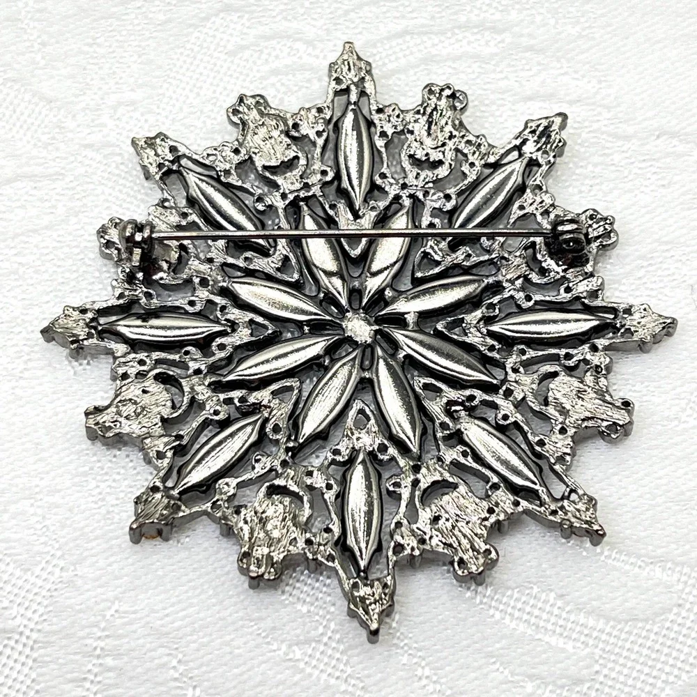 Vintage Clear Ornate Rhinestone Starburst Snowflake Silver Gunmetal Tone Brooch
